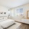open bedroom with queen bed