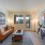 living room with couch and fine art 