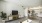 living room with coach and fine art 